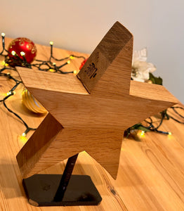Wooden star on Iron stand